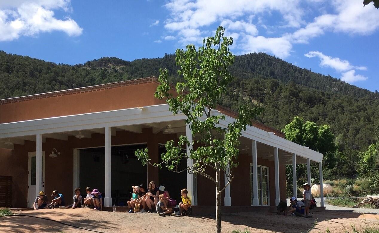 Summer campers enjoying lunch on the patio