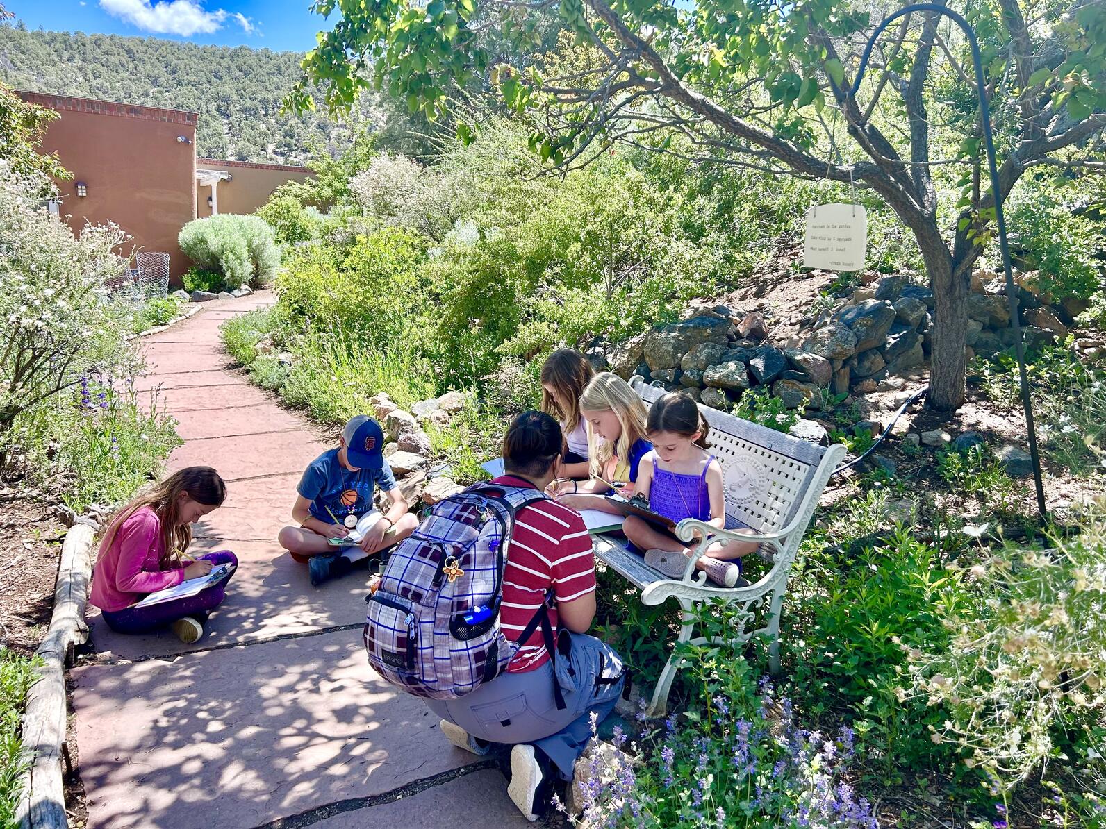 Campers writing haiku in the RDAC gardens